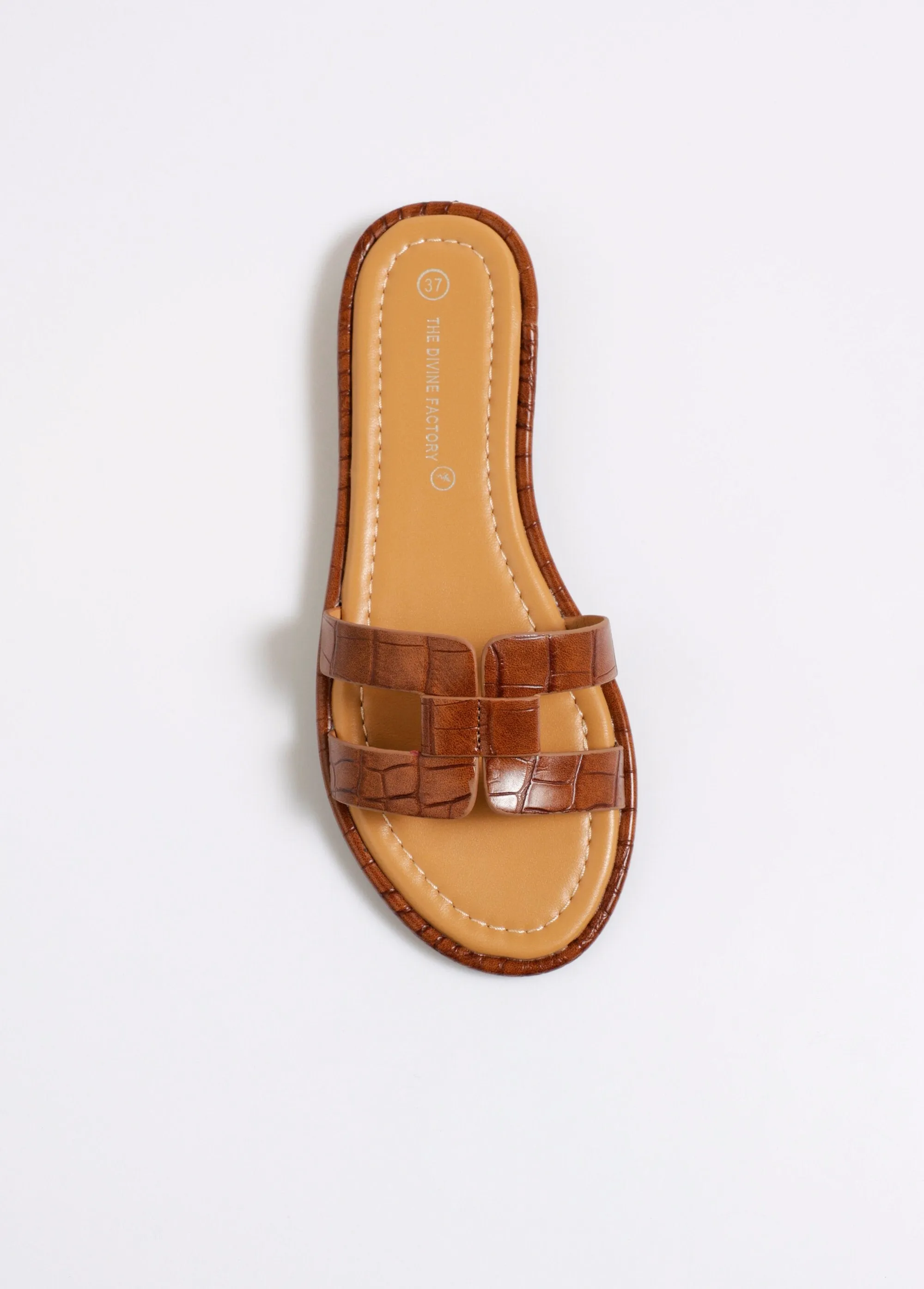 Chic crocodile-style flat mules