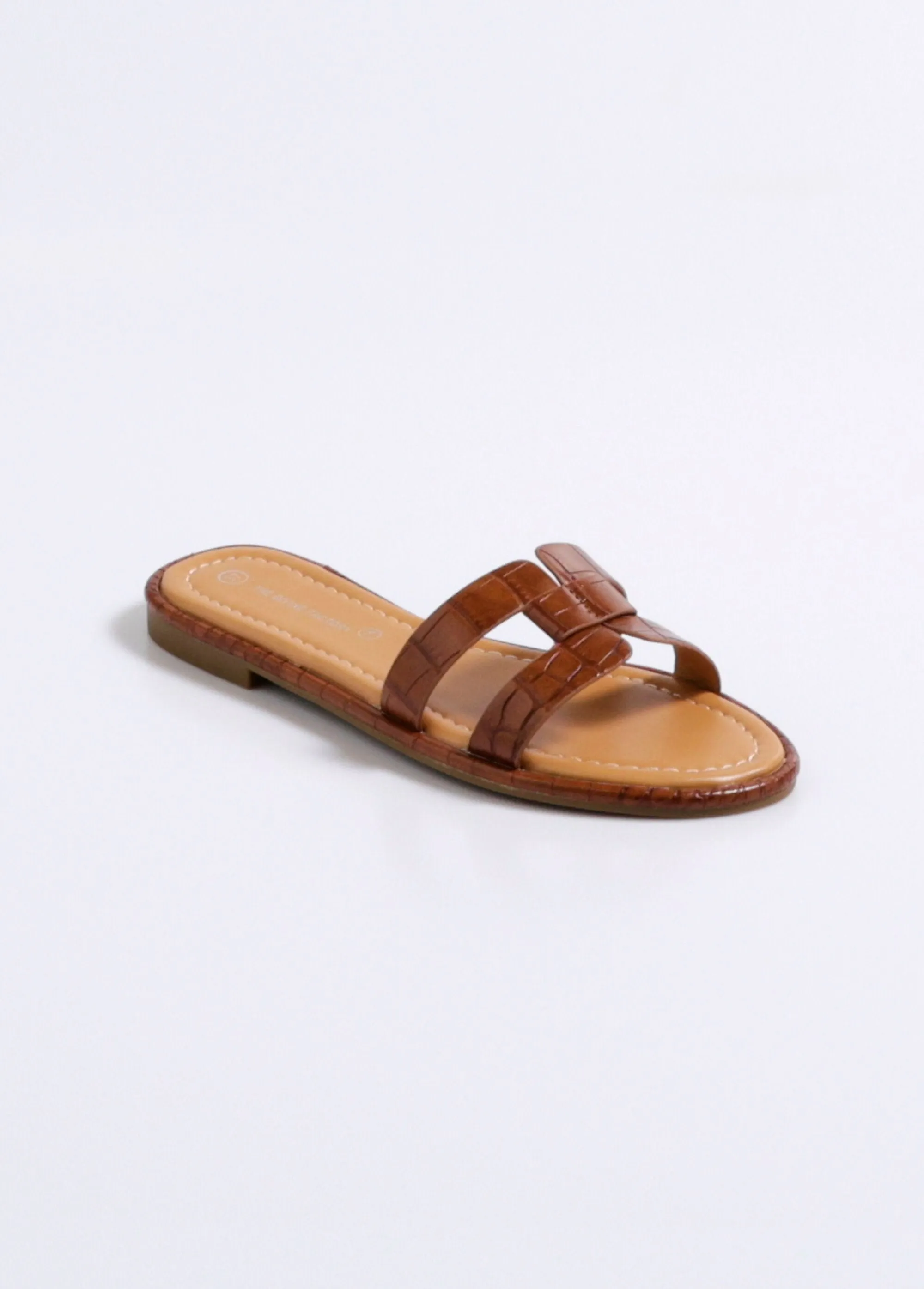 Chic crocodile-style flat mules