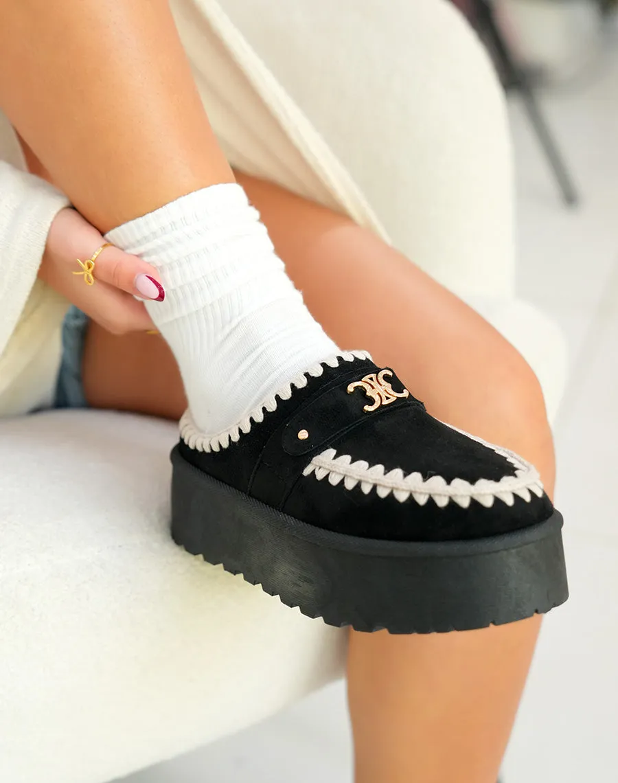 Mules femme noires tendance avec broderies beige et détail doré